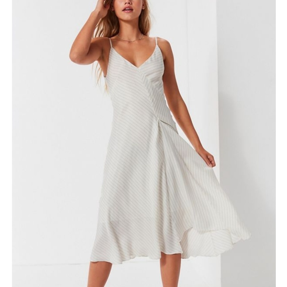 CAARA Bay Area Asymmetrical Striped Midi Dress